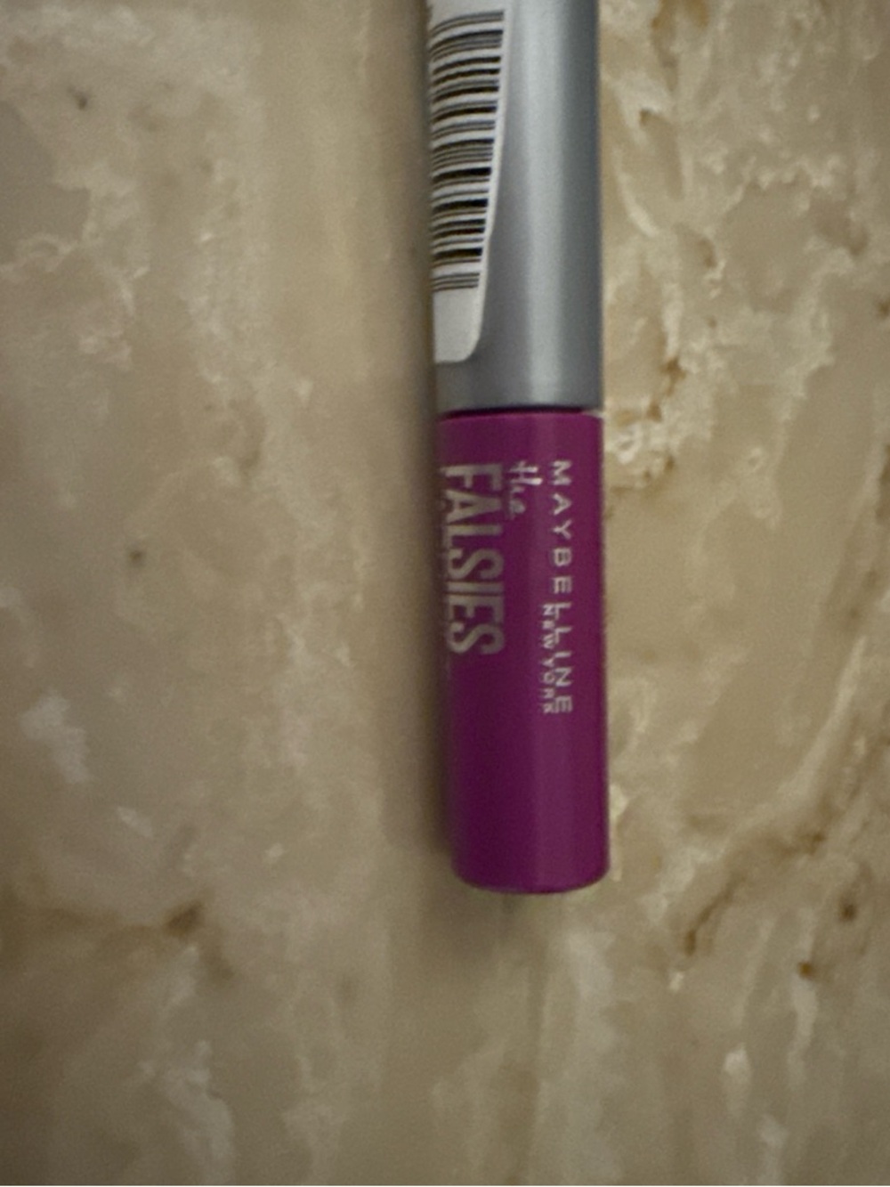 Maybelline Falsies Mascara Tube in Bright Purple with Silver Cap